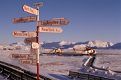 Direction sign outside the terminal at Kangerlussuaq/ Sondre Stromfjord airport in West Greenland. 1996