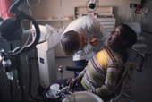 Nivikanguaq Simigaq, an Inuit woman, receiving dental treatment on the dentist's annual visit to her home village of Siorapaluk. Northwest Greenland. (1977)