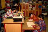 Elizabeth Hansen, an Inuit teacher, and her pupils in the school at Savissivik. Northwest Greenland. (1998)