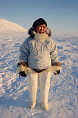 Mikivssuk Karlsen, an Inuit woman, in traditional winter clothing at Savissivik. Thule, Northwest Greenland. (1998)