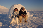 Inuit couple sitting outside an Igloo in Northwest Greenland. MR for Mikissuk Karlsen. 1998