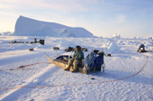 Ole Nielsen, an Inuit hunter rests on his sled while seal hunting in Melville Bay. N.W. Greenland. 1998