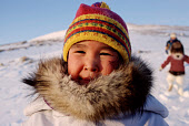Ane Sofie Imina, an Inuit girl, warmly wrapped up against the winter cold.in Qaanaaq. Northwest Greenland. (1998)