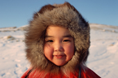 Arnanguaq Qujaukitsok, an Inuit girl from Thule wearing a fox fur hood. Northwest Greenland. 1998