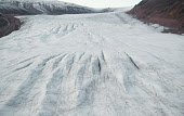 Aerial view of a glacier flowing down from the icecap near the bottom of Bowdoin Fiord. Thule. Avanersuaq, Northwest Greenland