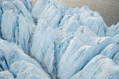 Aerial view of heavily crevassed ice on the top of an iceberg in Inglefield Bay. Thule, Northwest Greenland.