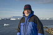 Bryan Alexander, a British photographer who specialises in the Arctic. Photographed at Qaanaaq in Northwest Greenland. (2021)