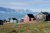 Wooden houses in the Inuit community of Qaanaaq. Northwest Greenland. (2022)