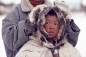 Young Chukchi boy wearing traditional fur clothing. Chukotka. Siberia. Russia. 1994