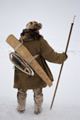 Yuri Ilkay, an elderly Chukchi, dressed for winter seal hunting. Uelen, Chukotka, Siberia, Russia. 2002