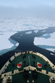 The bow of the Russian icebreaker Kapitan Dranitsyn cutting through sea ice. Franz Josef Land. 2004