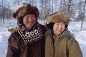 Roman Elrika, an Even reindeer herder with his 11 year old son, Misha. Northern Evensk, Magadan Region, E. Siberia, Russia. 2006