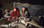 Even reindeer herders, Vitally & Ulita Elrika inside their tent at a winter camp in N. Evensk, Magadan Region, E. Siberia, Russia. 2006