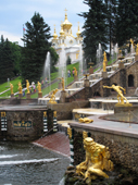 The Great Cascade, fountains and gilded statues, with the East Chapel in the background. Peterhof. Near St. Petersburg, Russia. 2010