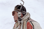Velodeya Turdalgin, a Nganasan man, wearing traditional clothing and a Shaman's headdress. Taymyr, Northern Siberia, Russia. 2004
