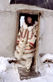 Nadiya Asyandu, a Nganasan woman, dressed in traditional reindeer skin clothing at a camp on the Kheta river. Taymyr, Northern Siberia, Russia. 2004