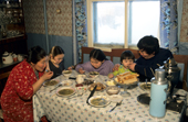 The Potapova family having lunch at their home in Verkhoyansk, Yakutia, Siberia, Russia. 1999