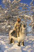 Pavel Sleptsov, a 35 year old hunter, on his horse at Korban in the winter time. Yakutia, Republic of Sakha, Russia. (1999)