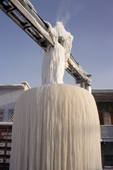 Ice forms around a leaking water pipe during the winter in Yakutsk. Yakutia, Siberia, Russia. 2001