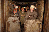 Workers in a lift at the end of their shift at the October Mine near Norilsk. Western Siberia, Russia. 2000