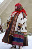 A Khanty woman in traditional dress at a Spring festival in the village of Pitlyar. Yamal, Western Siberia, Russia