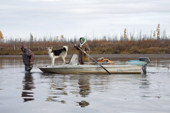 A Khanty family travelling to their winter camp on the Synya River. Yamal, Western Siberia, Russia