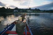 Netting a Grilse on the River Tay at dusk. Perthshire.